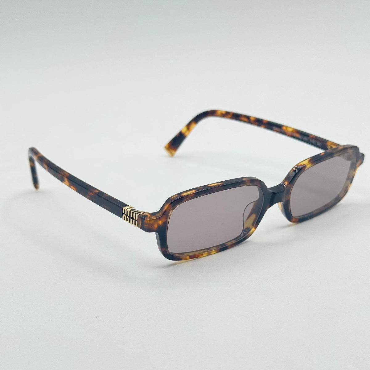 MiuMiu SMU 11Z — Tre quarti
