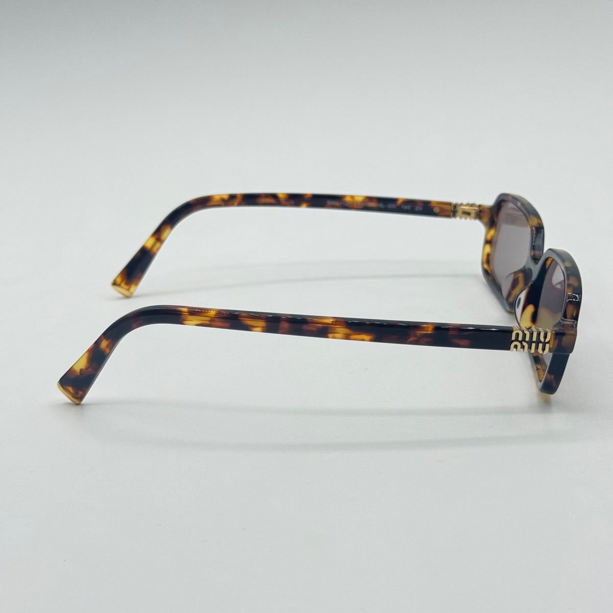 MiuMiu SMU 11Z — Fianco