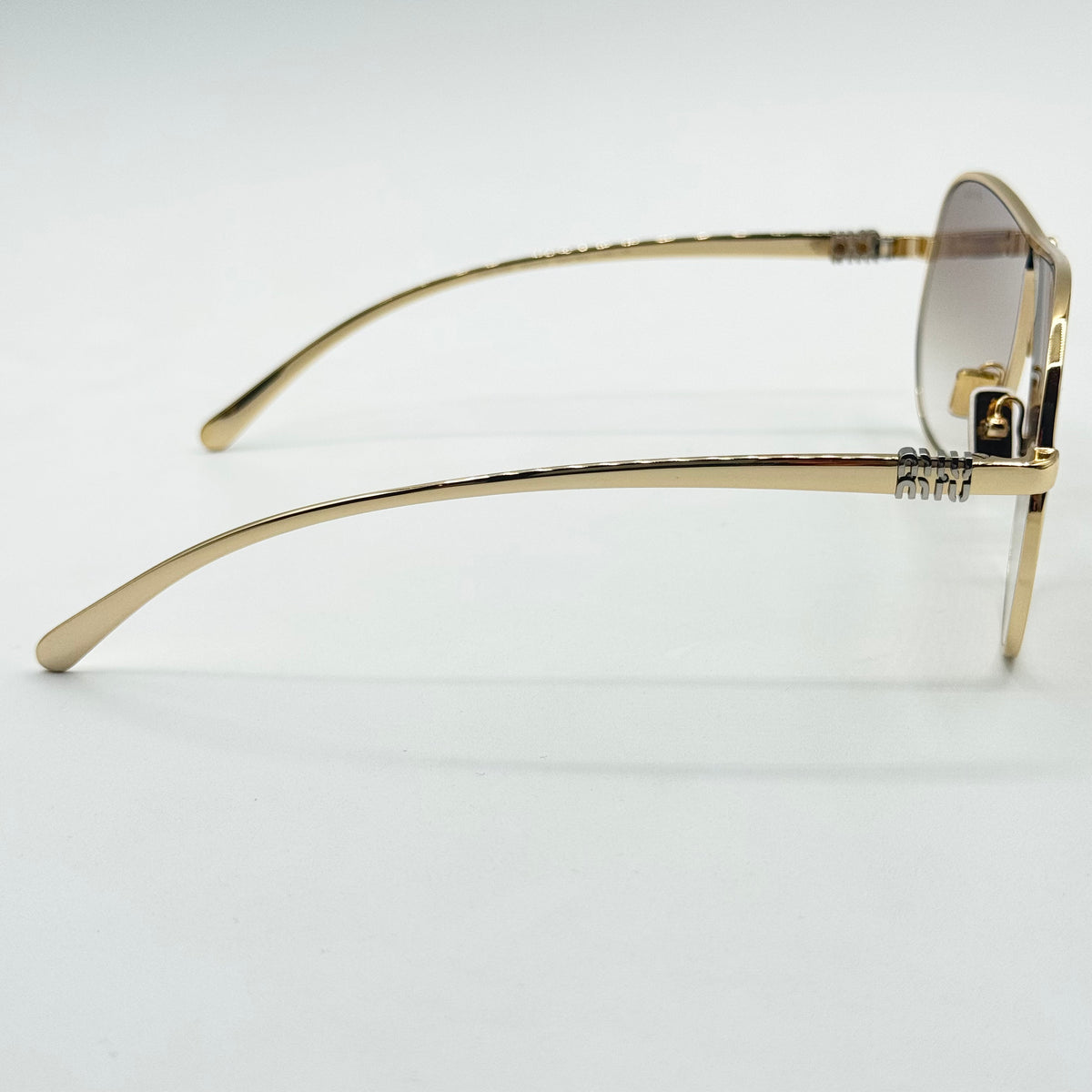 MiuMiu SMU A56 — Fianco