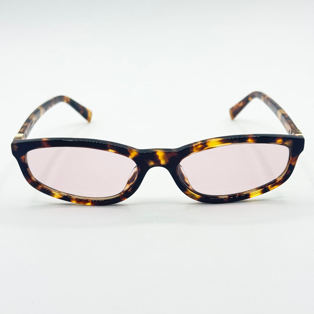 MiuMiu SMU A06 — Fronte