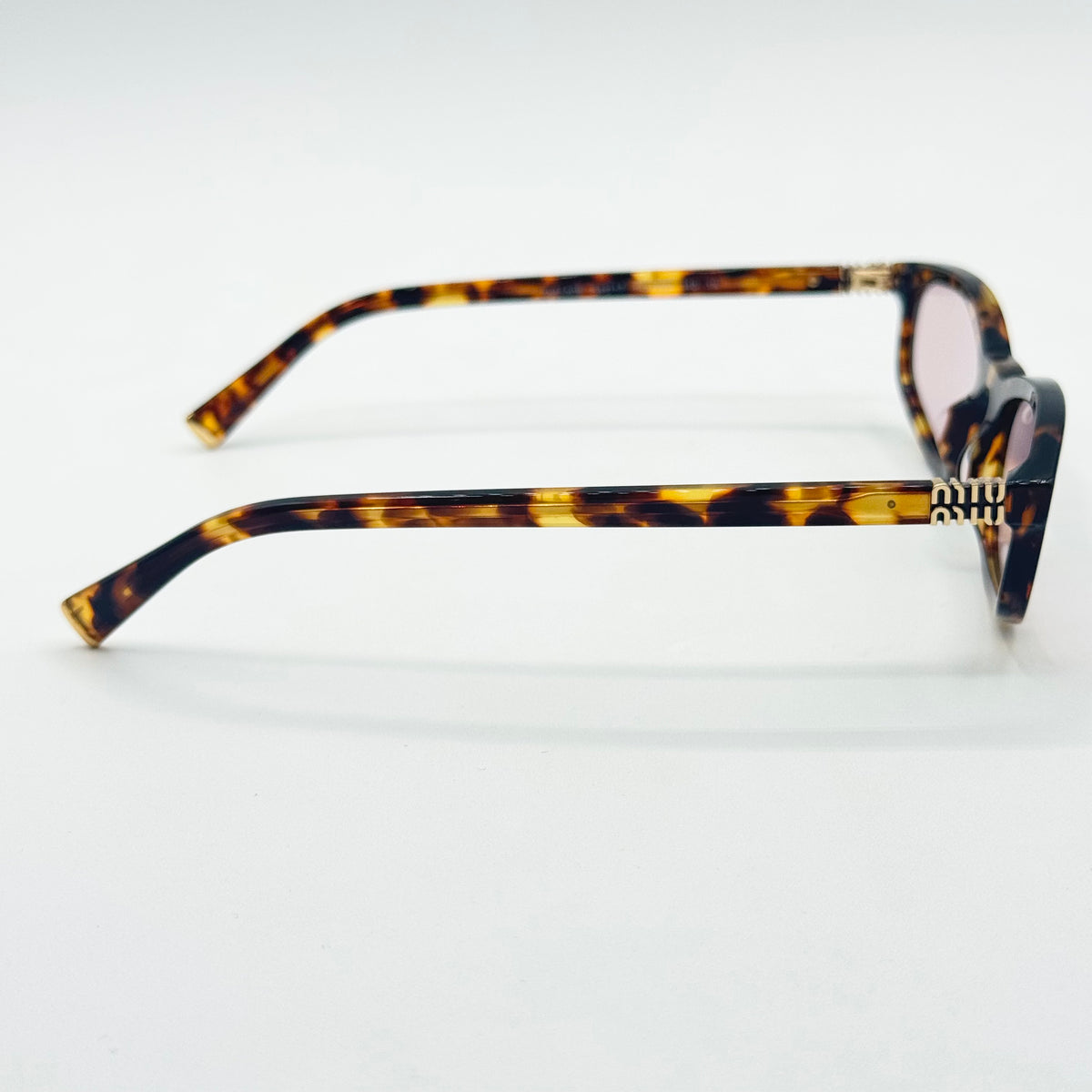 MiuMiu SMU A06 — Fianco