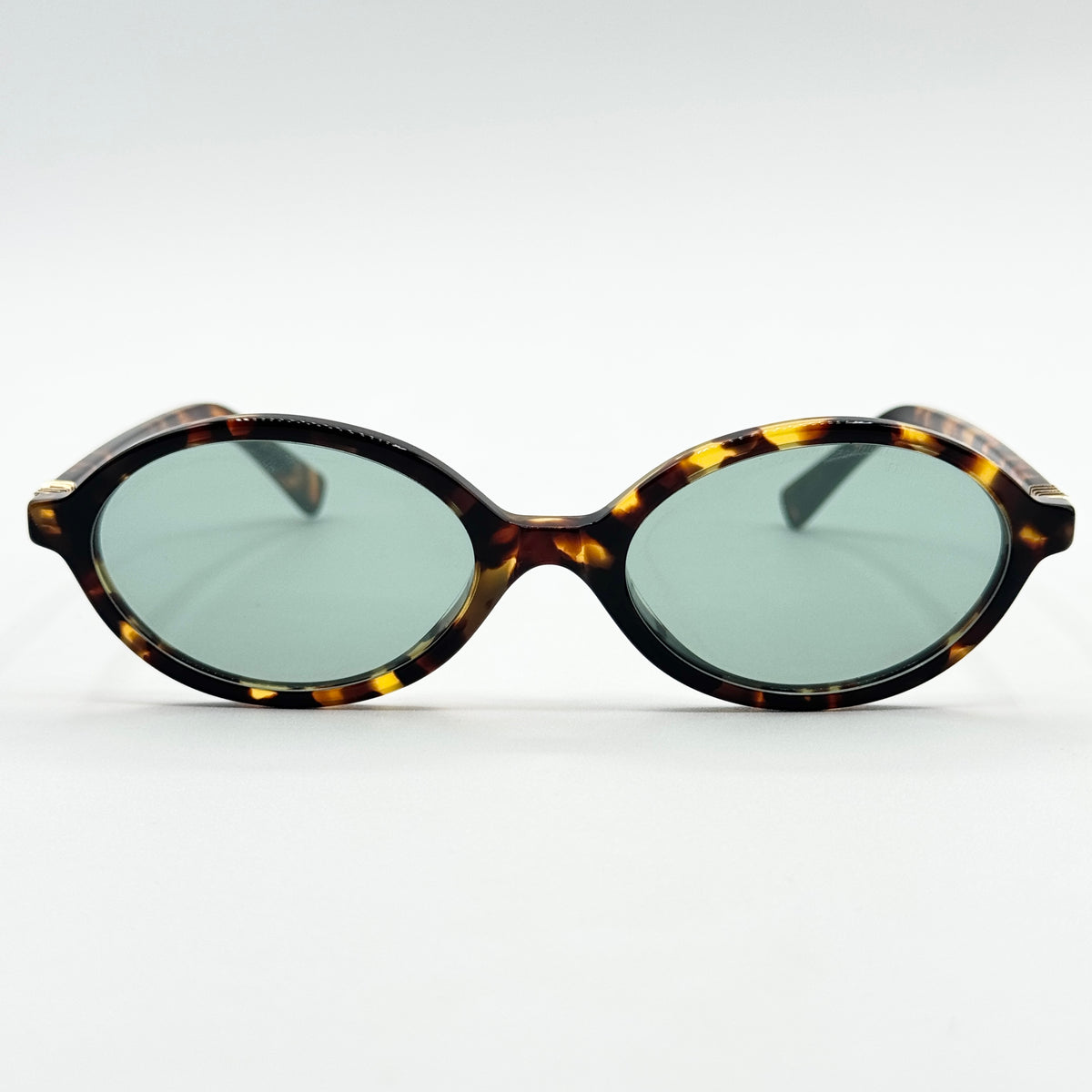MiuMiu SMU 04Z — Fronte