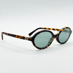 MiuMiu SMU 04Z — Tre quarti