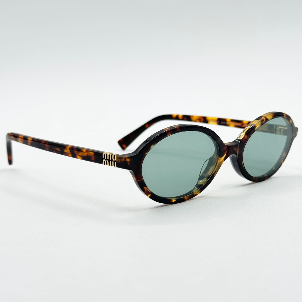 MiuMiu SMU 04Z — Tre quarti
